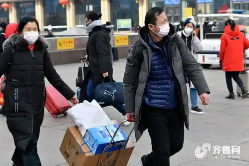 组图新冠肺炎疫情下的济南火车站返程旅客戴口罩沉默前行
