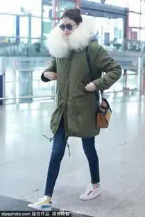 组图超模何穗现身首都机场身着超厚棉衣难掩高挑身材
