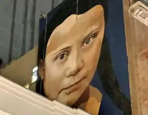 环保少女好莱坞巨幅壁画将完工,网友越看越不对劲连连呼叫普京
