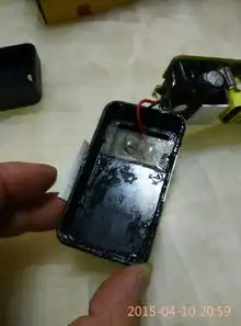 手机充电器烧坏了,里面有油一样的东西,求解答,
